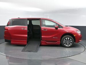 Red Honda Odyssey with BraunAbility Side Entry Automatic In Floor conversion