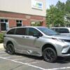 Silver Toyota Sienna with BraunAbility Side Entry Automatic Fold Out conversion