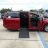 Red Chrysler Pacifica with Driverge Side Entry Automatic Fold Out conversion