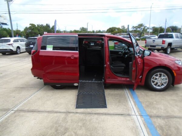 Red Chrysler Pacifica with Driverge Side Entry Automatic Fold Out conversion