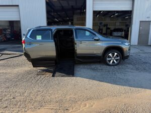 Silver Chevrolet Traverse with BraunAbility Side Entry Automatic In Floor conversion