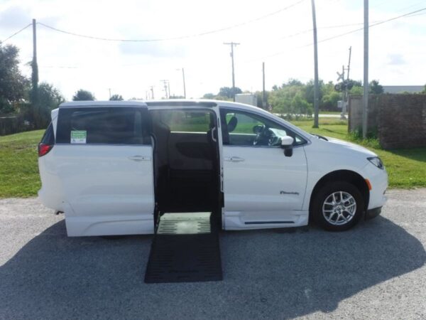 White Chrysler Voyager with BraunAbility Side Entry Automatic Fold Out conversion