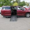 Red Chrysler Voyager with BraunAbility Side Entry Manual Fold Out conversion