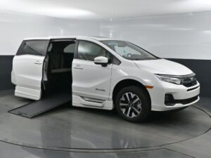 White Honda Odyssey with BraunAbility Side Entry Automatic In Floor conversion