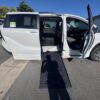 White Toyota Sienna with BraunAbility Side Entry Automatic Fold Out conversion