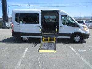 White Ford Transit with Driverge Side Entry Automatic Fold Out conversion