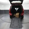 Red Chrysler Voyager with BraunAbility Rear Entry Manual Fold Out conversion