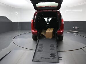 Red Chrysler Voyager with BraunAbility Rear Entry Manual Fold Out conversion