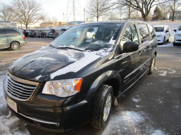 Grey Chrysler Town and Country with BraunAbility Side Entry Manual Fold Out conversion