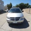 Silver Dodge Grand Caravan with BraunAbility Side Entry Automatic Fold Out conversion