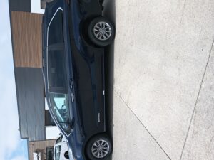 Blue Toyota Sienna with Driverge Rear Entry Manual Fold Out conversion