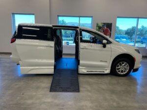 White Chrysler Voyager with BraunAbility Side Entry Automatic Fold Out conversion