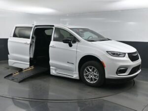 White Chrysler Pacifica with BraunAbility Side Entry Automatic Fold Out conversion