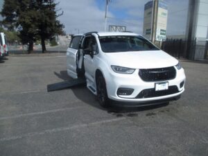 White Chrysler Pacifica with BraunAbility Side Entry Automatic In Floor conversion