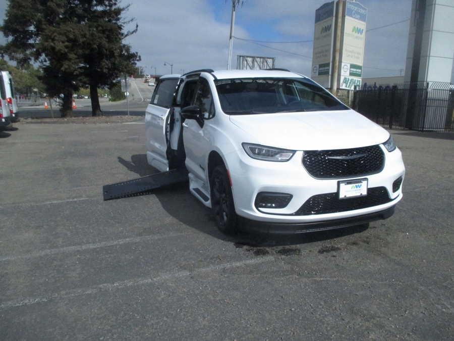 White Chrysler Pacifica with BraunAbility Side Entry Automatic In Floor conversion