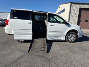White Dodge Grand Caravan with BraunAbility Side Entry Manual Fold Out conversion