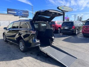 Black Toyota Sienna with Driverge Rear Entry Manual Fold Out conversion