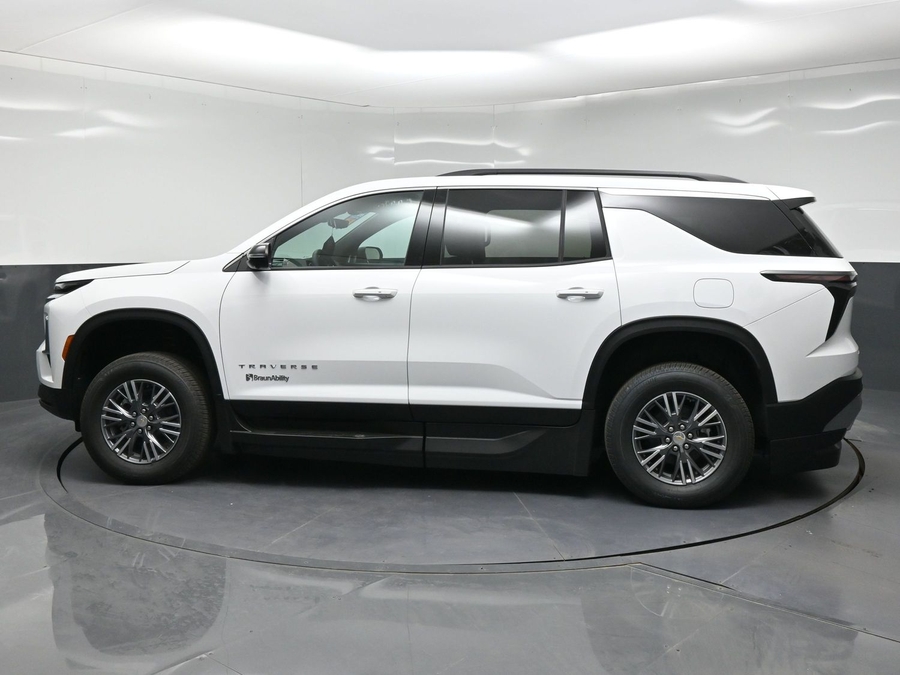 White Chevrolet Traverse with BraunAbility Side Entry Automatic In Floor conversion