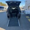 Blue Toyota Sienna with Driverge Rear Entry Manual Fold Out conversion