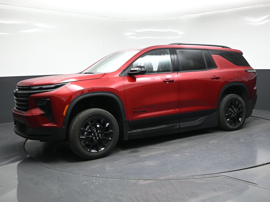 Red Chevrolet Traverse with BraunAbility Side Entry Automatic In Floor conversion