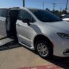 White Chrysler Pacifica with BraunAbility Side Entry Automatic Fold Out conversion