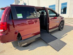 Black Toyota Sienna with BraunAbility Side Entry Automatic Fold Out conversion