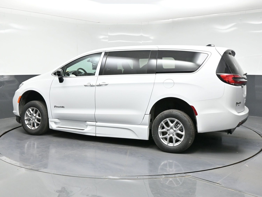 White Chrysler Pacifica with BraunAbility Side Entry Automatic Fold Out conversion