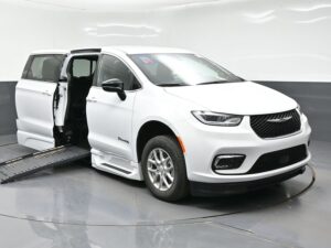 White Chrysler Pacifica with BraunAbility Side Entry Automatic Fold Out conversion