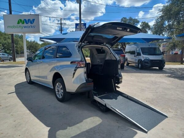Silver Toyota Sienna with Driverge Rear Entry Manual Fold Out conversion