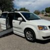 White Dodge Grand Caravan with BraunAbility Side Entry Automatic Fold Out conversion