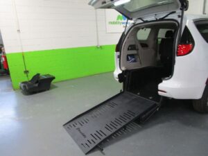 White Chrysler Voyager with BraunAbility Rear Entry Manual Fold Out conversion