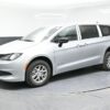 Silver Chrysler Voyager with BraunAbility Rear Entry Manual Fold Out conversion