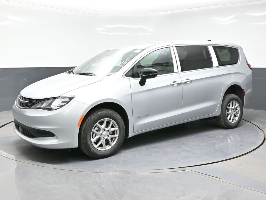 Silver Chrysler Voyager with BraunAbility Rear Entry Manual Fold Out conversion