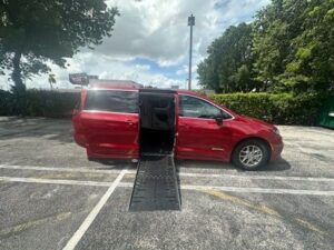 Red Chrysler Pacifica with Driverge Side Entry Automatic Fold Out conversion