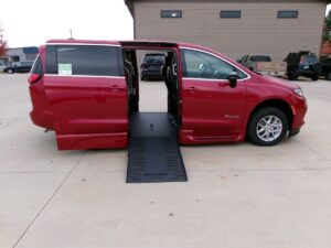 Red Chrysler Pacifica with BraunAbility Side Entry Automatic Fold Out conversion