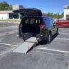 Black Chrysler Pacifica with Driverge Rear Entry Manual Fold Out conversion