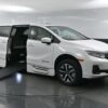 White Honda Odyssey with BraunAbility Side Entry Automatic In Floor conversion