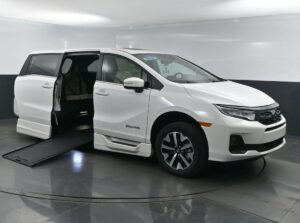 White Honda Odyssey with BraunAbility Side Entry Automatic In Floor conversion