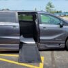 Grey Honda Odyssey with BraunAbility Side Entry Automatic In Floor conversion