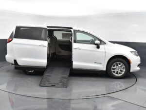 White Chrysler Voyager with BraunAbility Side Entry Manual Fold Out conversion