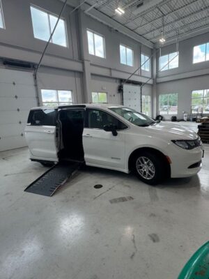 White Chrysler Voyager with Driverge Side Entry Automatic Fold Out conversion