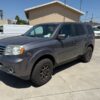 Silver Honda Pilot with Freedom Motors Rear Entry Manual Fold Out conversion