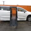 White Chrysler Pacifica with BraunAbility Side Entry Automatic Fold Out conversion
