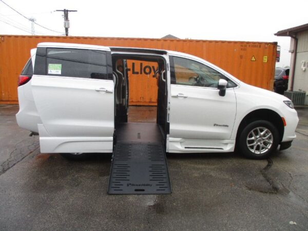 White Chrysler Pacifica with BraunAbility Side Entry Automatic Fold Out conversion