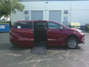 Red Toyota Sienna with BraunAbility Side Entry Automatic In Floor conversion