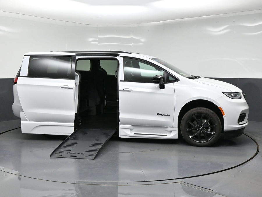 White Chrysler Pacifica with BraunAbility Side Entry Automatic Fold Out conversion
