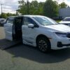 White Honda Odyssey with BraunAbility Side Entry Automatic In Floor conversion