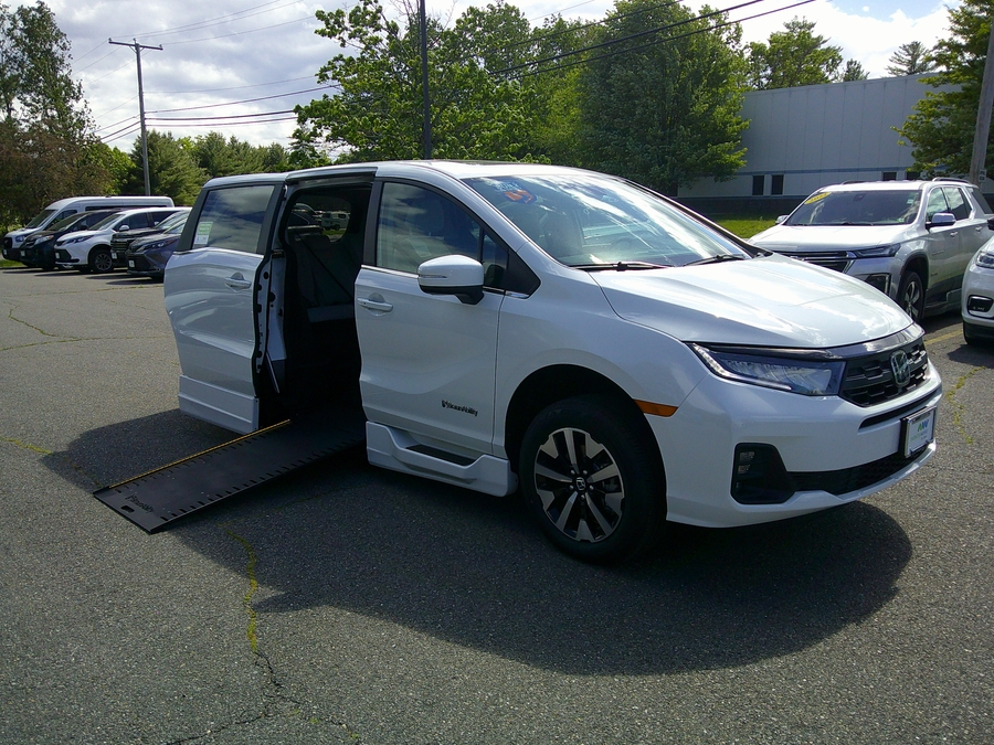White Honda Odyssey with BraunAbility Side Entry Automatic In Floor conversion