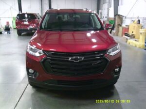 Red Chevrolet Traverse with BraunAbility Side Entry Automatic In Floor conversion
