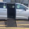 Silver Chrysler Pacifica with Driverge Side Entry Automatic Fold Out conversion